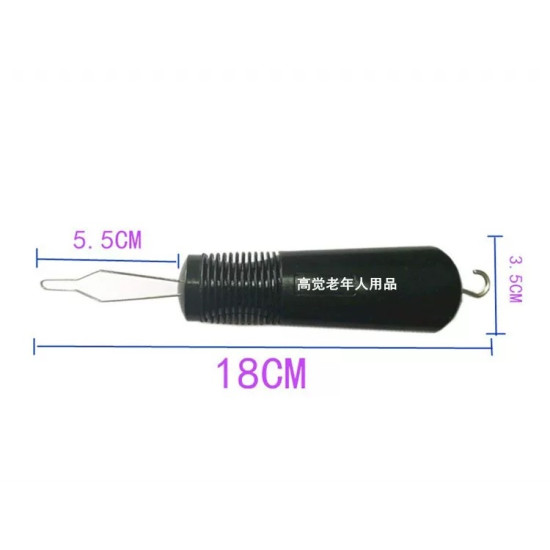 Hand holding a black button hook tool fastening a white shirt button