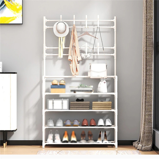 Black metal multi-tier stand with hooks for hanging clothes and bags, and shelves holding shoes and accessories