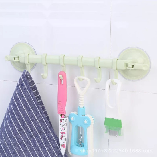Multi-use No-Drill Hook Bar for Kitchen, Bathroom, and Travel Beige suction cup hook bar mounted on white tiled wall holding kitchen towel, pink knife, corkscrew, and peeler