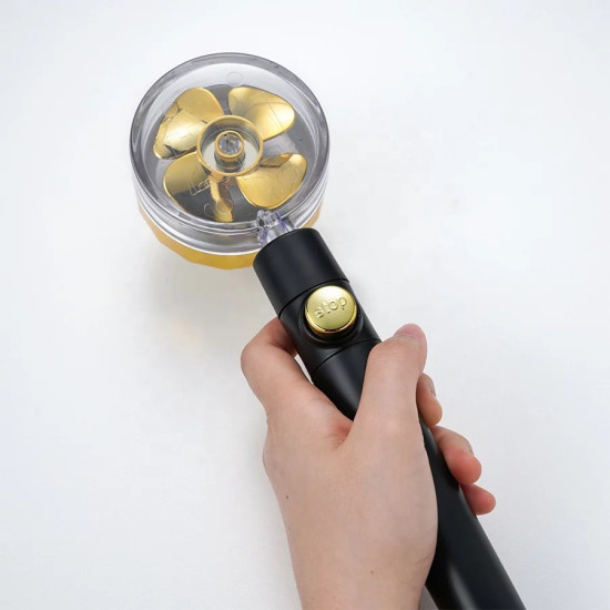 Shower Head with Water Filter and Pressure Boost - Gold Turbofan and Stop Button Black shower head with transparent cover, gold turbofan inside, and gold stop button on handle