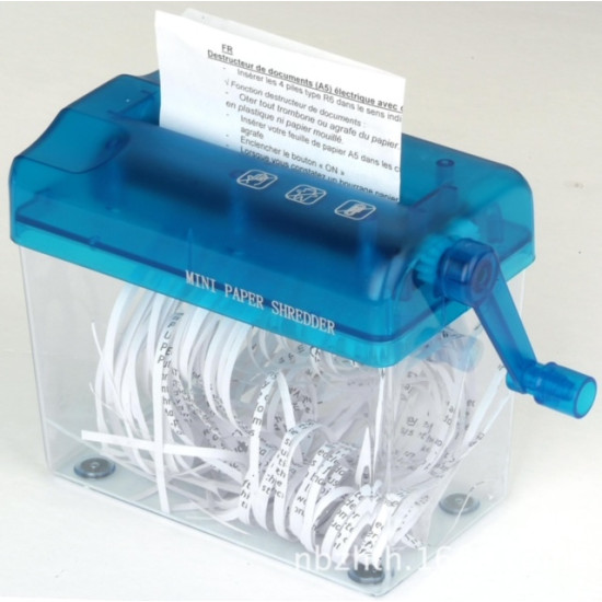 Mini hand crank paper shredder with blue translucent top and clear container holding curled shredded paper strips
