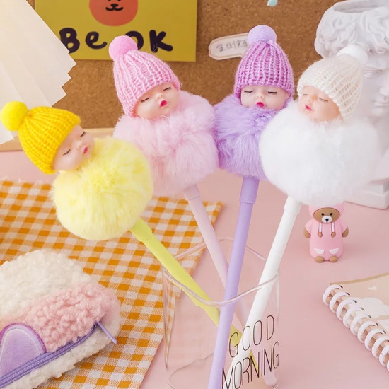 Colorful Doll Head Pens with Fluffy Pompoms for School and Office Four colorful pens with doll heads wearing knitted hats and fluffy pompom bodies in yellow, pink, purple, and white