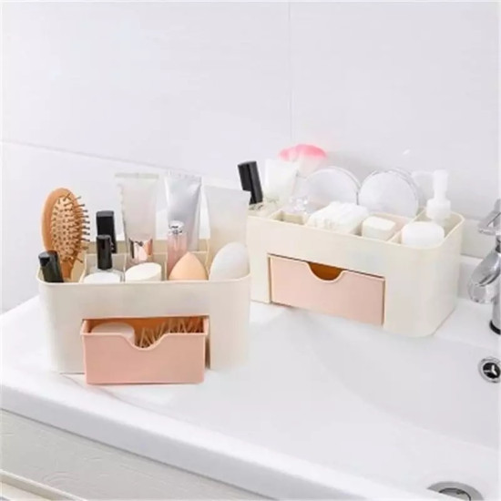 Cream Cosmetic Organizer with Peach Drawer and Multiple Compartments cream cosmetic organizer with multiple compartments and a peach drawer holding brushes, bottles, and beauty tools