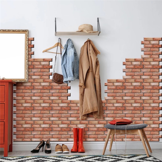 Entryway wall partially covered with red brick pattern 3D foam panels with coats and shoes below