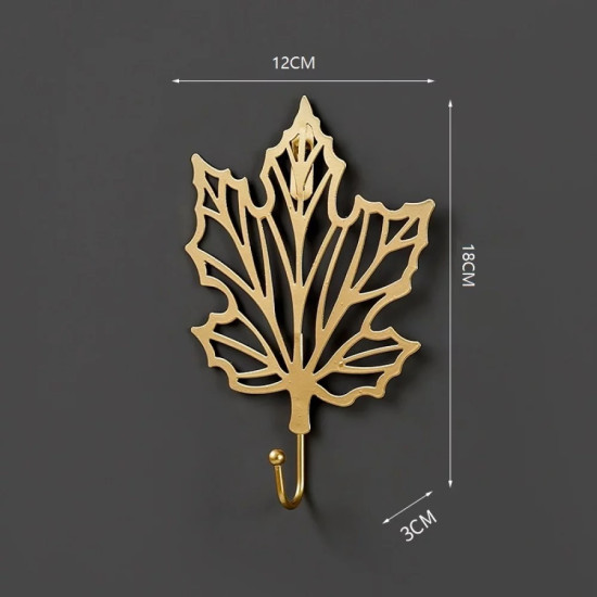Golden metal wall hook shaped like a maple leaf outline with a single curved hook