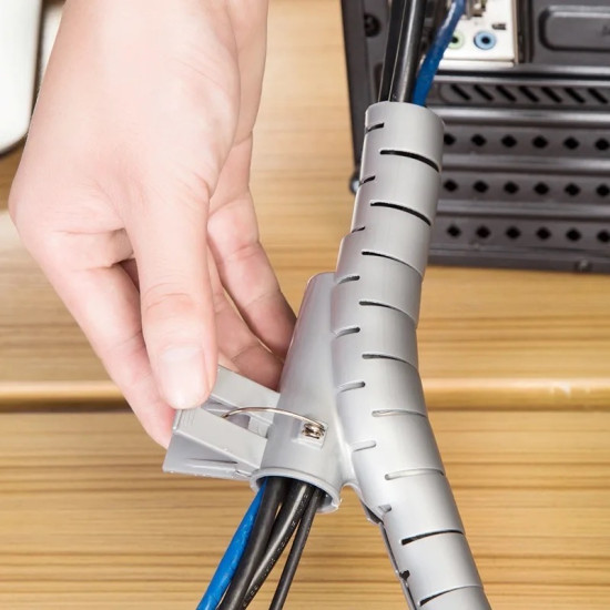 Flexible Cable Organizer with Spring Clip - Gray Gray flexible cable organizer with spiral cuts securing multiple cables using a spring clip