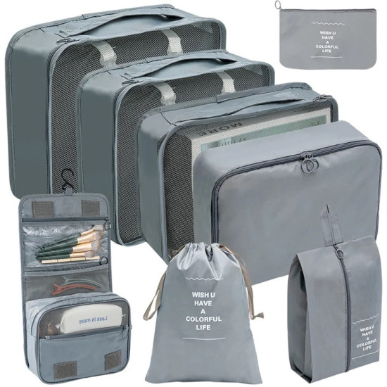 Gray travel bag organizer set with mesh fronts, including packing cubes, drawstring pouch, and toiletry bag