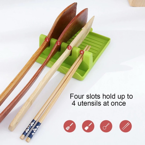 Green utensil holder with four slots holding wooden spoons and chopsticks Green utensil holder with four vertical slots holding three wooden spoons and one pair of wooden chopsticks with blue and white patterned ends. The holder has a rectangular drip tray with ridges. Text on image reads 'Four slots hold up to 4 utensils at on