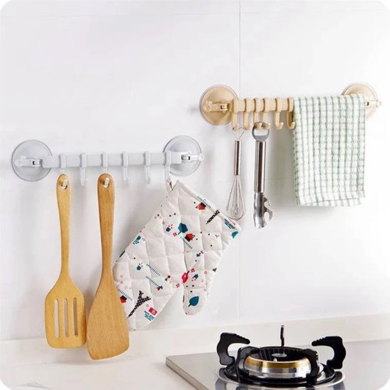 Multi-use No-Drill Kitchen and Bathroom Hook Holder Two wall-mounted hook bars with suction cups holding kitchen utensils, oven mitt, and towel on white tiled wall