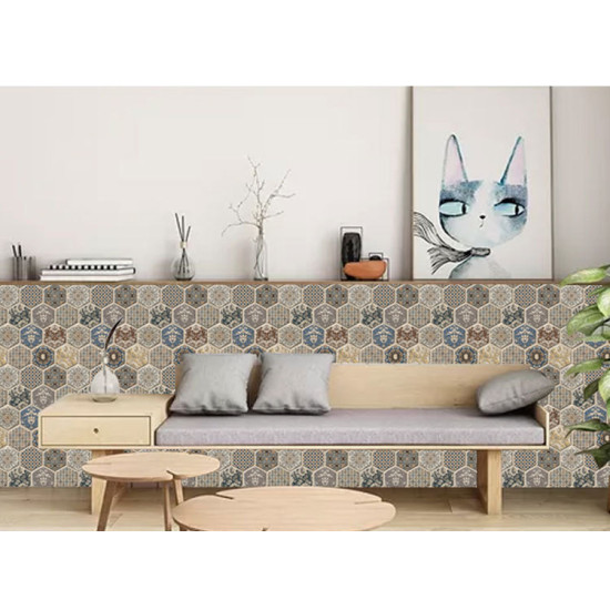 3D self-adhesive foam wall decor with hexagonal blue and beige floral patterns behind sofa