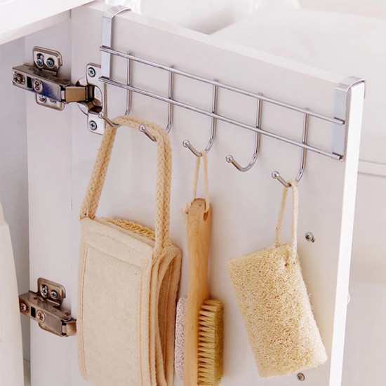 Metal cabinet door hanger with six hooks holding bath scrubbers and brushes