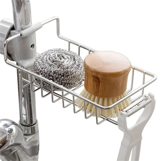 metal wire basket holder attached to kitchen faucet holding scrubber, brush, and peeler