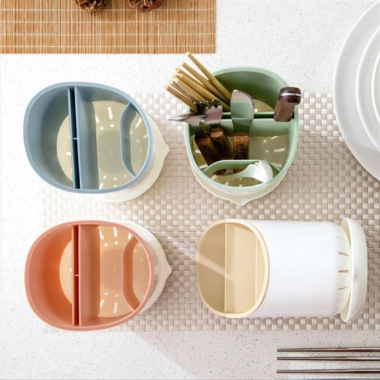 Multicolor multisection cutlery organizers with round white drip trays, one holding various utensils
