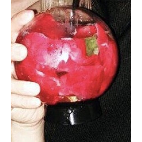 Sporty Design Glass Ball Cup for Drinks and Hospitality Round glass cup with a red iced beverage and black base held by hand