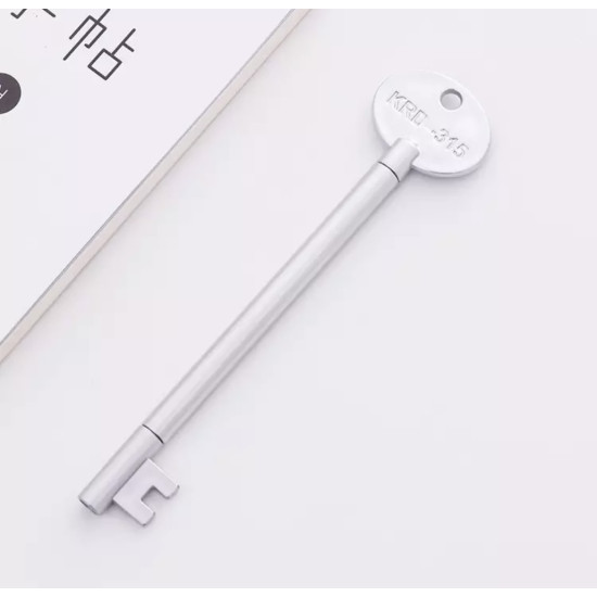Silver pen shaped like a key with KRD-315 engraving on the oval top