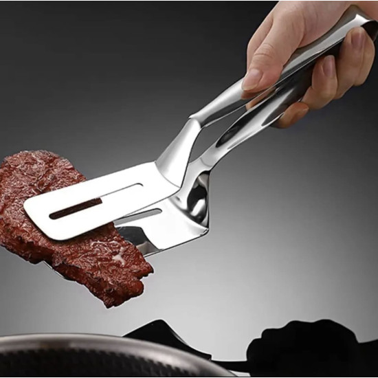 3-in-1 Stainless Steel Cooking Tongs for Flipping Frying and Serving Hand holding stainless steel cooking tongs with a flat head lifting a cooked steak piece