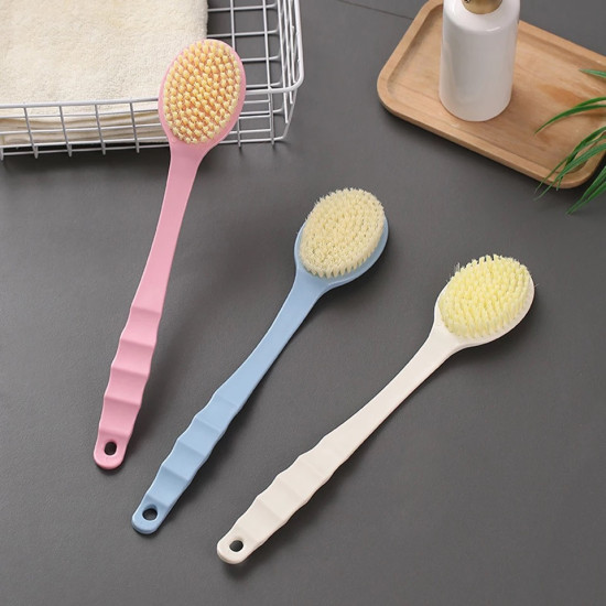 Three long-handle body brushes with yellow bristles in pink, blue, and white handles