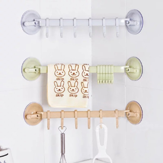 Multi-use No-Drill Wall-Mounted Hook Bars with Suction Cups Three wall-mounted hook bars with suction cups in white, green, and beige, each with six hooks for hanging items