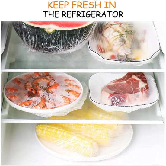 Various food items including watermelon, shrimp, meat, and corn covered with transparent stretchable food wrap in