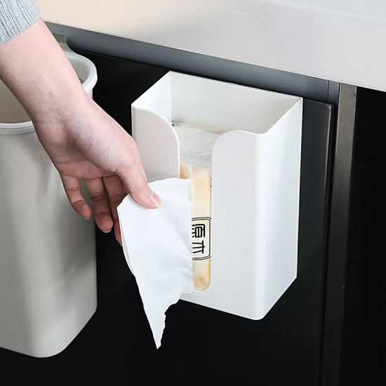 White Adhesive Multiuse Tissue Box Holder White adhesive tissue box holder mounted on a black surface with a hand pulling a tissue