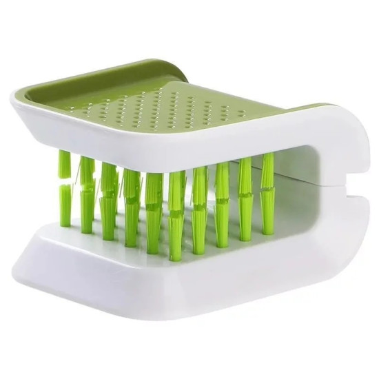 Compact white and green cleaning brush with dense vertical bristles for cleaning corners and narrow spaces