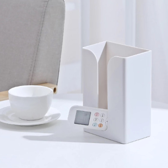 Multi-Use Adhesive Tissue Box Organizer for Walls and Desks White multi-compartment organizer for desk or wall with remote control holder